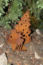 Hirsch vor Sternenbaum auf Platte