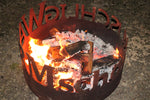 Feuerstelle mit Worten "Kuschelig, warm, schön"